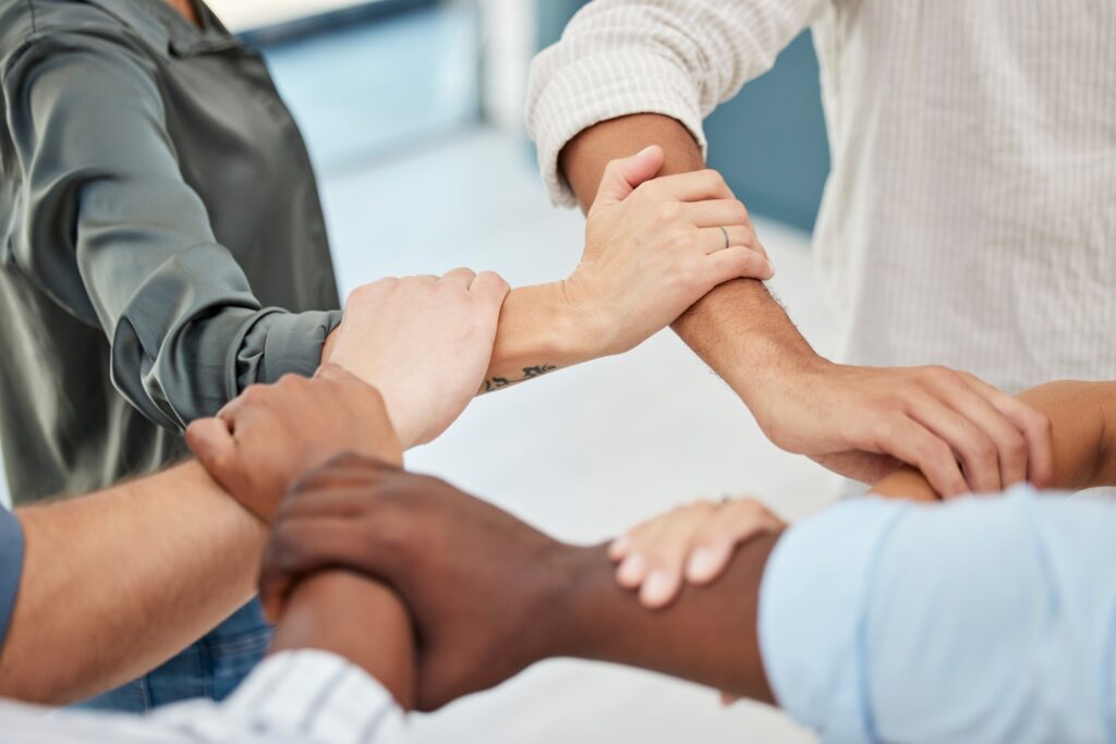 Hands, office community and diversity employee group together to show support and trust. Business,